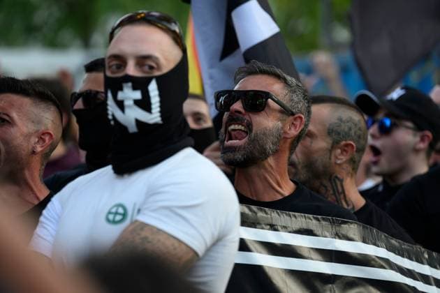 July 31, 2026, Madrid, Spain: MADRID, SPAIN Ã¢â‚¬ JULY 31, 2026: Participants attend a demonstration outside the Moroccan Embassy in Madrid, called by the far-right groups Falange EspaoÂ±ola and NoÂºcleo Nacional, following recent migrant arrivals through Spain s North African enclave of Ceuta. Protesters wave Spanish flags, display banners and chant slogans during the demonstration, while some participants are seen making gestures commonly associated with Nazi salutes. Madrid Spain  - ZUMAq101 20260731_zna_q101_210 Copyright: xTomasxCallex