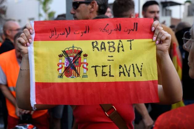 July 31, 2026, Madrid, Spain: MADRID, SPAIN Ã¢â‚¬ JULY 31, 2026: Participants attend a demonstration outside the Moroccan Embassy in Madrid, called by the far-right groups Falange EspaoÂ±ola and NoÂºcleo Nacional, following recent migrant arrivals through Spain s North African enclave of Ceuta. Protesters wave Spanish flags, display banners and chant slogans during the demonstration, while some participants are seen making gestures commonly associated with Nazi salutes. Madrid Spain  - ZUMAq101 20260731_zna_q101_219 Copyright: xTomasxCallex