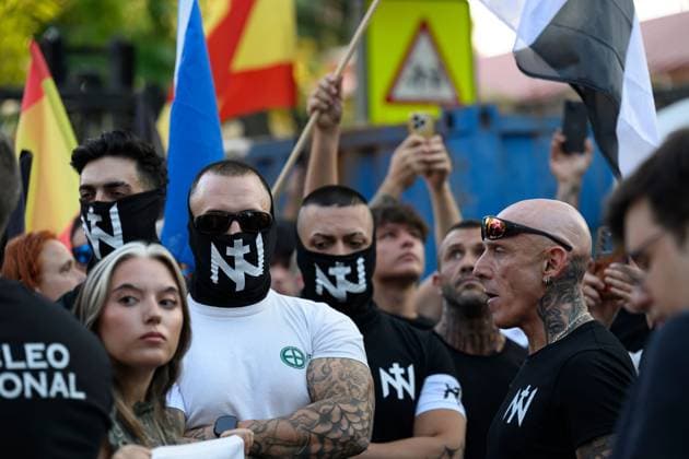 July 31, 2026, Madrid, Spain: MADRID, SPAIN Ã¢â‚¬ JULY 31, 2026: Participants attend a demonstration outside the Moroccan Embassy in Madrid, called by the far-right groups Falange EspaoÂ±ola and NoÂºcleo Nacional, following recent migrant arrivals through Spain s North African enclave of Ceuta. Protesters wave Spanish flags, display banners and chant slogans during the demonstration, while some participants are seen making gestures commonly associated with Nazi salutes. Madrid Spain  - ZUMAq101 20260731_zna_q101_229 Copyright: xTomasxCallex