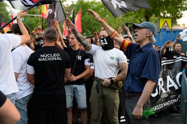 July 31, 2026, Madrid, Spain: MADRID, SPAIN Ã¢â‚¬ JULY 31, 2026: Participants attend a demonstration outside the Moroccan Embassy in Madrid, called by the far-right groups Falange EspaoÂ±ola and NoÂºcleo Nacional, following recent migrant arrivals through Spain s North African enclave of Ceuta. Protesters wave Spanish flags, display banners and chant slogans during the demonstration, while some participants are seen making gestures commonly associated with Nazi salutes. Madrid Spain - ZUMAq101 20260731_zna_q101_207 Copyright: xTomasxCallex