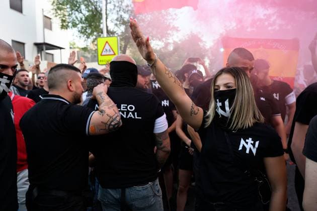 July 31, 2026, Madrid, Spain: MADRID, SPAIN Ã¢â‚¬ JULY 31, 2026: Participants attend a demonstration outside the Moroccan Embassy in Madrid, called by the far-right groups Falange EspaoÂ±ola and NoÂºcleo Nacional, following recent migrant arrivals through Spain s North African enclave of Ceuta. Protesters wave Spanish flags, display banners and chant slogans during the demonstration, while some participants are seen making gestures commonly associated with Nazi salutes. Madrid Spain - ZUMAq101 20260731_zna_q101_211 Copyright: xTomasxCallex