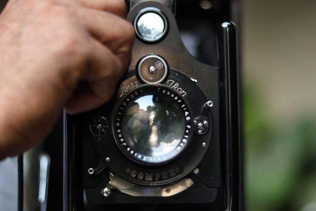 July 31, 2026, Cairo, Egypt: CAIRO, EGYPT Ã¢â‚¬ JULY 2026: Egyptian photojournalist Fareed Kotb poses with his restored 1930 Zeiss Ikon camera in Cairo, Egypt. Kotb gained international recognition for using the nearly century-old camera during his Project 1930, documenting the FIFA World Cup 2026 with a vintage camera manufactured in the same year as the inaugural FIFA World Cup. Cairo Egypt  - ZUMAq101 20260731_zna_q101_234 Copyright: xAbdullahxHamadax