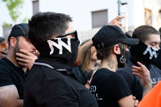 July 31, 2026, Madrid, Spain: MADRID, SPAIN Ã¢â‚¬ JULY 31, 2026: Participants attend a demonstration outside the Moroccan Embassy in Madrid, called by the far-right groups Falange EspaoÂ±ola and NoÂºcleo Nacional, following recent migrant arrivals through Spain s North African enclave of Ceuta. Protesters wave Spanish flags, display banners and chant slogans during the demonstration, while some participants are seen making gestures commonly associated with Nazi salutes. Madrid Spain - ZUMAq101 20260731_zna_q101_215 Copyright: xTomasxCallex