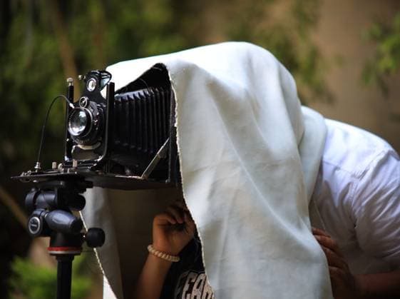 August 1, 2026, Cairo, Egypt: CAIRO, EGYPT Ã¢â‚¬ JULY 2026: Egyptian photojournalist Fareed Kotb poses with his restored 1930 Zeiss Ikon camera in Cairo, Egypt. Kotb gained international recognition for using the nearly century-old camera during his Project 1930, documenting the FIFA World Cup 2026 with a vintage camera manufactured in the same year as the inaugural FIFA World Cup. Cairo Egypt  - ZUMAq101 20260801_zna_q101_006 Copyright: xAbdullahxHamadax