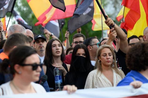 July 31, 2026, Madrid, Spain: MADRID, SPAIN Ã¢â‚¬ JULY 31, 2026: Participants attend a demonstration outside the Moroccan Embassy in Madrid, called by the far-right groups Falange EspaoÂ±ola and NoÂºcleo Nacional, following recent migrant arrivals through Spain s North African enclave of Ceuta. Protesters wave Spanish flags, display banners and chant slogans during the demonstration, while some participants are seen making gestures commonly associated with Nazi salutes. Madrid Spain - ZUMAq101 20260731_zna_q101_221 Copyright: xTomasxCallex