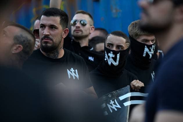 July 31, 2026, Madrid, Spain: MADRID, SPAIN Ã¢â‚¬ JULY 31, 2026: Participants attend a demonstration outside the Moroccan Embassy in Madrid, called by the far-right groups Falange EspaoÂ±ola and NoÂºcleo Nacional, following recent migrant arrivals through Spain s North African enclave of Ceuta. Protesters wave Spanish flags, display banners and chant slogans during the demonstration, while some participants are seen making gestures commonly associated with Nazi salutes. Madrid Spain - ZUMAq101 20260731_zna_q101_228 Copyright: xTomasxCallex