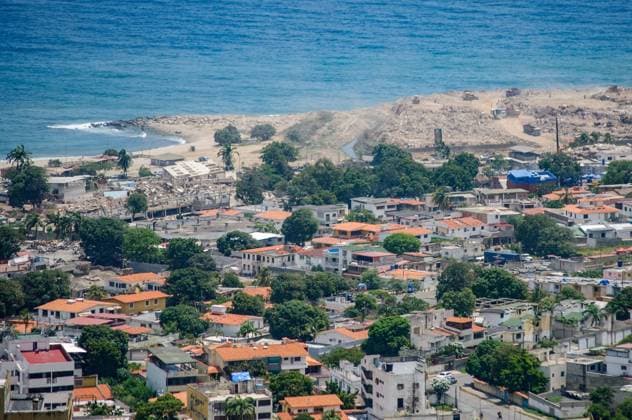 July 31, 2026, La Guaira, Venezuela (Bolivarian Republic of: CARABALLEDA, LA GUAIRA, VENEZUELA Ã¢â‚¬ JULY 30, 2026: Heavy machinery operates in the Caraballeda and Los Corales sectors of La Guaira state as crews carry out debris removal, sanitation work and ground leveling near residential areas. The continuous movement of dump trucks and earthmoving equipment reflects ongoing efforts to clear affected areas and prepare the terrain for recovery operations. La Guaira Venezuela (Bolivarian Republic of - ZUMAq101 20260731_zna_q101_244 Copyright: xMarioxFloresx
