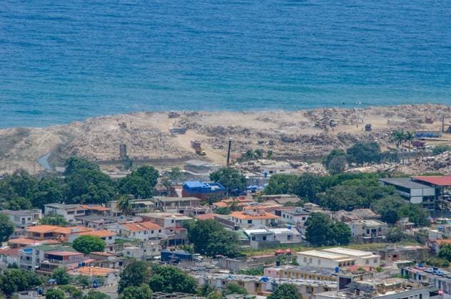 July 31, 2026, La Guaira, Venezuela (Bolivarian Republic of: CARABALLEDA, LA GUAIRA, VENEZUELA Ã¢â‚¬ JULY 30, 2026: Heavy machinery operates in the Caraballeda and Los Corales sectors of La Guaira state as crews carry out debris removal, sanitation work and ground leveling near residential areas. The continuous movement of dump trucks and earthmoving equipment reflects ongoing efforts to clear affected areas and prepare the terrain for recovery operations. La Guaira Venezuela (Bolivarian Republic of - ZUMAq101 20260731_zna_q101_246 Copyright: xMarioxFloresx