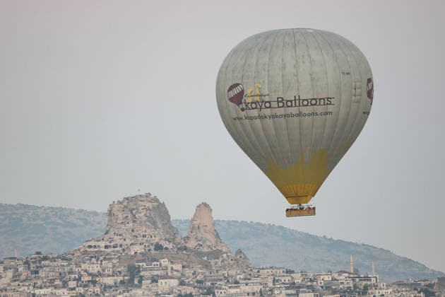 7th Cappadocia Balloon Festival NEVSEHIR, TURKIYE - AUGUST 01: Figure-shaped hot air balloons float above Cappadocia s fairy chimneys during the seventh Cappadocia Balloon Festival, on August 01, 2026 in Nevsehir, Turkiye. Organized by the Ministry of Culture and Tourism, the festival features 30 specially designed balloons brought from Turkiye and several other countries. During sunrise demonstration flights over Goreme, balloons shaped like hearts, owls, parrots, rockets and the Earth attracted the attention of local and international visitors. Osmancan Gurdogan Anadolu Nevsehir Turkey. Editorial use only. Please get in touch for any other usage.  Copyright: x2026xAnadoluxOsmancanxGurdoganx