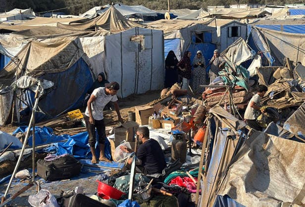 Displaced Palestinians inspect damage after Israeli strike in Deir al-Balah Displaced Palestinians inspect the damage to their tents and belongings following an Israeli airstrike that targeted the medical supplies and pharmaceuticals warehouse of Al-Aqsa Martyrs Hospital in Deir al-Balah, central Gaza Strip, on August 1, 2026. The strike caused extensive destruction to the warehouse and to tents sheltering displaced Palestinians near the targeted site. Photo by Ahmed Ibrahim apaimages Deir al-Balah Gaza Palestinian Territory 010826_Deir_al-Balah_AI_00(36) Copyright: xapaimagesxAhmedxIbrahimx xapaimagesx