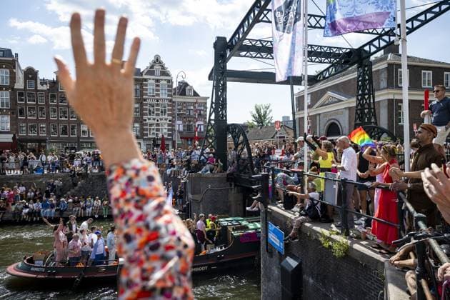 AMSTERDAM - Visitors during the Canal Parade. The boat parade is traditionally part of the Pride celebrations in the capital. RAMON VAN FLYMEN ANP netherlands out - belgium out  Copyright: xx x564680718x originalFilename: 564680718.jpg