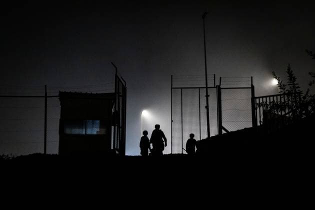 August 1, 2026, Ceuta, Spain: CEUTA, SPAIN - AUGUST 1, 2026: The arrival of migrants across the Tarajal border continues during the early hours of Saturday morning in Ceuta. Authorities maintain security and monitoring devices at the border crossing amid the ongoing influx. Ceuta Spain  - ZUMAq101 20260801_zna_q101_053 Copyright: xSamuelxVegax