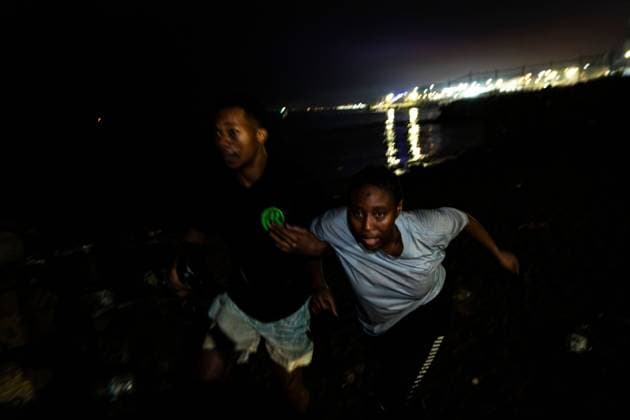 August 1, 2026, Ceuta, Spain: CEUTA, SPAIN - AUGUST 1, 2026: The arrival of migrants across the Tarajal border continues during the early hours of Saturday morning in Ceuta. Authorities maintain security and monitoring devices at the border crossing amid the ongoing influx. Ceuta Spain  - ZUMAq101 20260801_zna_q101_067 Copyright: xSamuelxVegax