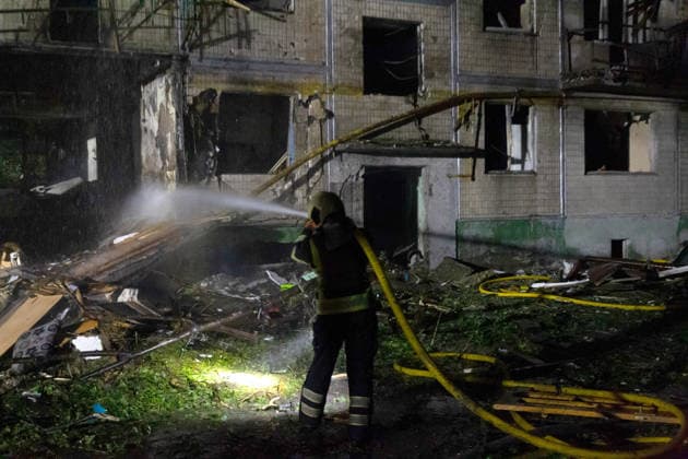 A State Emergency Service rescuer sprays water at the damaged structures of a five-storey apartment block in the Solomianskyi district, partially destroyed by an overnight Russian missile strike, Kyiv, Ukraine, August 1, 2026. The attack caused partial collapse and fire in the building. Rescue workers evacuated 35 residents from the upper floors. Two people were killed and eight injured.(Photo by Kyrylo Chubotin Ukrinform) Russian attack damages apartment block in Kyiv’s Solomianskyi district  Copyright: xKyryloxChubotinx