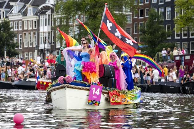 AMSTERDAM - Participants in the Canal Parade. The boat parade is traditionally part of the Pride celebrations in the capital. SEM VAN DER WAL ANP netherlands out - belgium out  Copyright: xx x564683323x originalFilename: 564683323.jpg