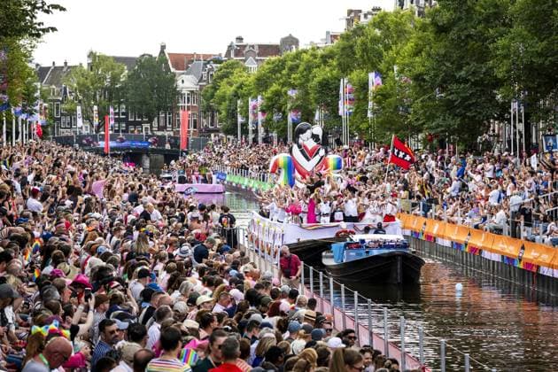 AMSTERDAM - Participants and spectators during the Canal Parade. The boat parade is traditionally part of the Pride celebrations in the capital. REMKO DE WAAL ANP netherlands out - belgium out  Copyright: xx x564683420x originalFilename: 564683420.jpg