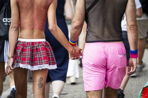 AMSTERDAM - Two visitors hold hands during the Canal Parade. The boat parade is traditionally part of the Pride celebrations in the capital. RAMON VAN FLYMEN ANP netherlands out - belgium out  Copyright: xx x564683758x originalFilename: 564683758.jpg