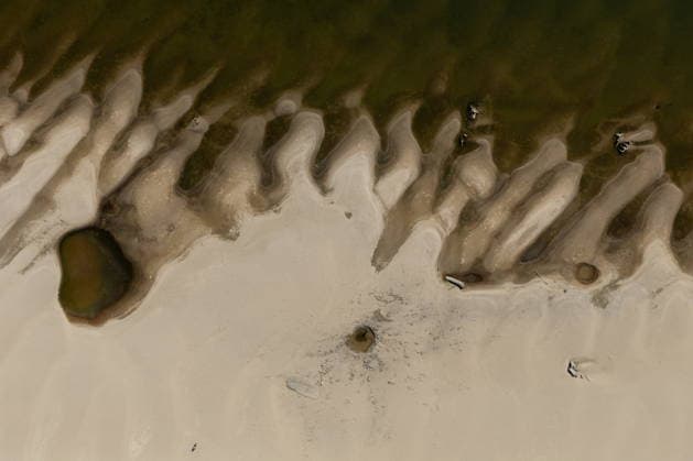 Batina 010826. Historically low water level of the Danube has revealed the remains of old cars, ships and weapons in its riverbed. In photo: craters made by recently destroyed bombs. Photo: Marin Franov CROPIX Copyright: xxMarinxFranovx batina_vodostaj59-010826