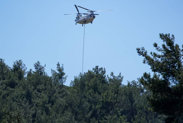 Firefighting efforts continue in Izmir??????? IZMIR, TURKIYE - AUGUST 01: Turkish General Directorate of Forestry teams and firefighters, supported by aircraft, fight a forest fire in the Tinaztepe neighborhood of Buca district in Izmir, Turkiye on August 01, 2026. Aerial and ground teams continue efforts to bring the blaze under control. Berkan Cetin Anadolu Izmir Turkey. Editorial use only. Please get in touch for any other usage.  Copyright: x2026xAnadoluxBerkanxCetinx