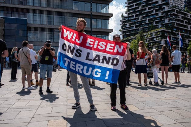 August 1, 2026, Utrecht, Utrecht, The Netherlands: The organization Save Europe Act is kicking off the so-called European Shield Tour at Jaarbeursplein in Utrecht. During the demonstration, several participants are wearing clothing bearing the word Ã¢â‚¬ËœRemigration,Ã¢â‚¬â ¢ and a large banner with the same text is rolled out. Speakers are calling for remigration. Among those present, several Dutch flags and a Flemish flag are visible. Utrecht The Netherlands  - ZUMAg281 20260801_zaf_g281_020 Copyright: xStormxGroenendijkx