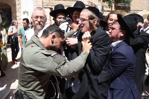 Ultra-Orthodox Protest in Jerusalem WEST JERUSALEM August 1, 2026: Ultra-Orthodox Jewish protesters clash with police officers and secular Jewish demonstrators during a protest against the opening of a cafÃ on Shabbat in West Jerusalem. The demonstration took place after protesters opposed the operation of the cafÃ during the Jewish day of rest. JERUSALEM Israel Copyright: x xSaeedxQaqx xJNAxPressx