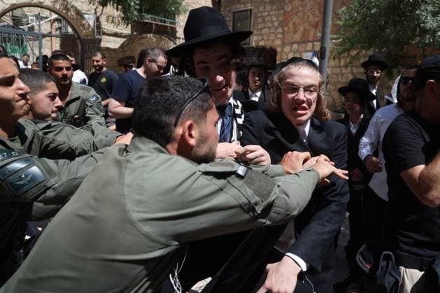 Ultra-Orthodox Protest in Jerusalem WEST JERUSALEM August 1, 2026: Ultra-Orthodox Jewish protesters clash with police officers and secular Jewish demonstrators during a protest against the opening of a cafÃ on Shabbat in West Jerusalem. The demonstration took place after protesters opposed the operation of the cafÃ during the Jewish day of rest. JERUSALEM Israel Copyright: x xSaeedxQaqx xJNAxPressx