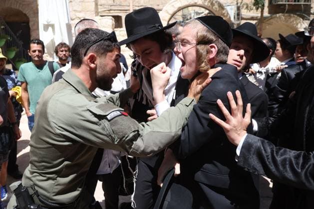 Ultra-Orthodox Protest in Jerusalem WEST JERUSALEM August 1, 2026: Ultra-Orthodox Jewish protesters clash with police officers and secular Jewish demonstrators during a protest against the opening of a cafÃ on Shabbat in West Jerusalem. The demonstration took place after protesters opposed the operation of the cafÃ during the Jewish day of rest. JERUSALEM Israel Copyright: x xSaeedxQaqx xJNAxPressx