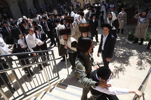 Ultra-Orthodox Protest in Jerusalem WEST JERUSALEM August 1, 2026: Ultra-Orthodox Jewish protesters clash with police officers and secular Jewish demonstrators during a protest against the opening of a cafÃ on Shabbat in West Jerusalem. The demonstration took place after protesters opposed the operation of the cafÃ during the Jewish day of rest. JERUSALEM Israel Copyright: x xSaeedxQaqx xJNAxPressx