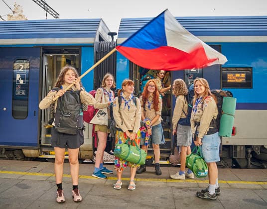 A group of Czech Scouts set out today, on Saturday, August 1st, 2026, on the morning train from the Prague Main Station to Budapest for this year s Central European Jamboree in Hungary, including ten Girl Scouts from Prague-Brevnov who said they would introduce participants from several European countries to some Czech traditions. The girls, who also packed typical Czech snacks into their backpacks, have been going to camps with their troop since their childhood, but for most of them, this is their first international Scouting experience. They are curious about the activities prepared for them by the local Hungarians as well as Scouts from Poland, Slovakia, Romania and other countries, and are looking forward to exchanging scarves, badges a  CTKPhotoP2026080101958