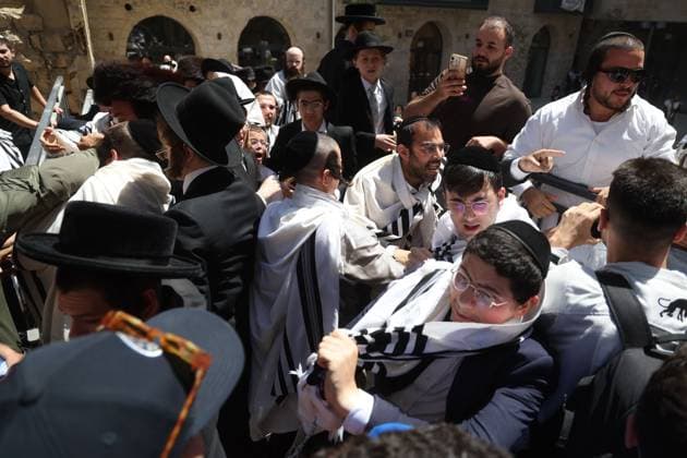 August 1, 2026, Jerusalem, Israel: WEST JERUSALEM Ã¢â‚¬ August 1, 2026: Ultra-Orthodox Jewish protesters clash with police officers and secular Jewish demonstrators during a protest against the opening of a cafo on Shabbat in West Jerusalem. The demonstration took place after protesters opposed the operation of the cafo during the Jewish day of rest. Jerusalem Israel  - ZUMAq101 20260801_zna_q101_119 Copyright: xSaeedxQaqx