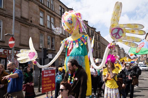 August 1, 2026, Glasgow, Scotland, UK: Hundreds of people took part in this years Govanhill International Festival & Carnival parade, a community-led anti-racist arts and cultural event organised by the Govanhill Baths Community Trust. The annual festival, themed Solidarity this year, was founded in response to racist attacks in the area. Glasgow UK - ZUMAs357 20260801_zip_s357_008 Copyright: xCameronxScottx