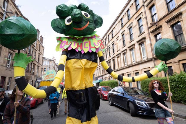 August 1, 2026, Glasgow, Scotland, UK: Hundreds of people took part in this years Govanhill International Festival & Carnival parade, a community-led anti-racist arts and cultural event organised by the Govanhill Baths Community Trust. The annual festival, themed Solidarity this year, was founded in response to racist attacks in the area. Glasgow UK - ZUMAs357 20260801_zip_s357_010 Copyright: xCameronxScottx