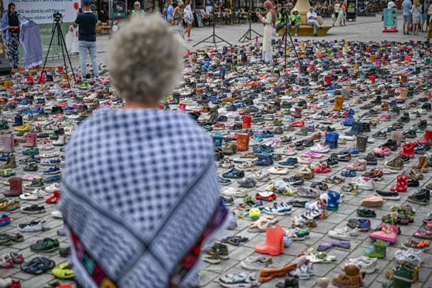 Thousands of shoes displayed on The Hague Beach in memory of children killed in Gaza THE HAGUE, NETHERLANDS - AUGUST 1: Thousands of shoes are placed on Scheveningen Beach during a public memorial to symbolize children killed in Gaza, in The Hagues, Netherlands on August 01, 2026. The installation, held near the Kurhaus, formed part of a peaceful demonstration calling attention to the humanitarian impact of the war, with participants gathering throughout the day to pay tribute and express solidarity. Mouneb Taim Anadolu The Hague Netherlands. Editorial use only. Please get in touch for any other usage.  Copyright: x2026xAnadoluxMounebxTaimx