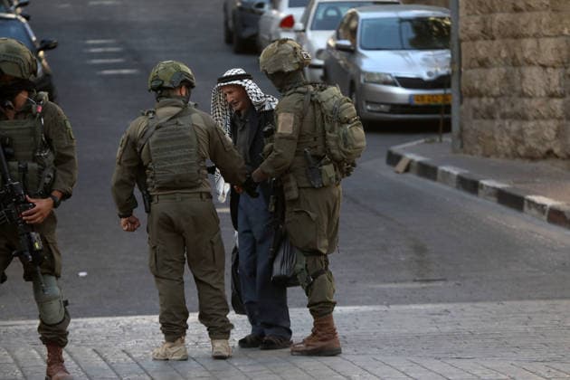 Israeli-protected settlers tour Hebron s Old City Israeli settlers walk through the Old City of Hebron, in the occupied West Bank, under the protection of Israeli troops after the forces closed roads and alleys in the area, restricting the movement of Palestinian residents during the raid, on August 1, 2026. Photo by Mamoun Wazwaz apaimages Hebron West Bank Palestinian Territory 010826_Hebron_MW_00(16) Copyright: xapaimagesxMamounxWazwazx xapaimagesx