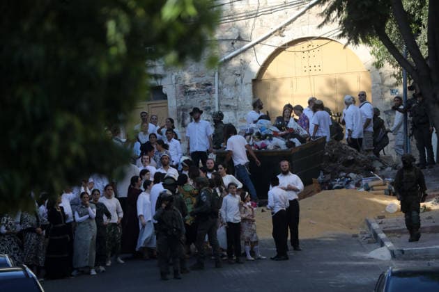 Israeli-protected settlers tour Hebron s Old City Israeli settlers walk through the Old City of Hebron, in the occupied West Bank, under the protection of Israeli troops after the forces closed roads and alleys in the area, restricting the movement of Palestinian residents during the raid, on August 1, 2026. Photo by Mamoun Wazwaz apaimages Hebron West Bank Palestinian Territory 010826_Hebron_MW_00(12) Copyright: xapaimagesxMamounxWazwazx xapaimagesx
