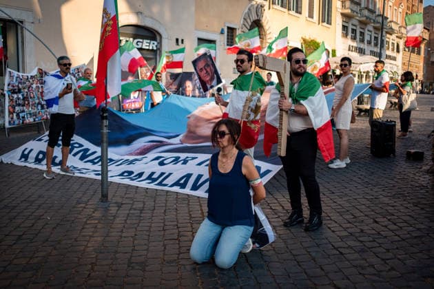 August 1, 2026, Rome, Rm, Italy: Members of the anti-regime Iranian community in Rome gather in Largo Torre Argentina. They are protesting against the repression and executions of opponents carried out by the Iranian regime and support the return to power of Crown Prince Reza Pahlavi. Rome Italy - ZUMAg256 20260801_znp_g256_001 Copyright: xMarcoxDixGianvitox