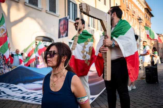 August 1, 2026, Rome, Rm, Italy: Members of the anti-regime Iranian community in Rome gather in Largo Torre Argentina. They are protesting against the repression and executions of opponents carried out by the Iranian regime and support the return to power of Crown Prince Reza Pahlavi. Rome Italy - ZUMAg256 20260801_znp_g256_007 Copyright: xMarcoxDixGianvitox