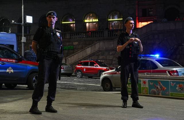 Russia Moscow Cafe Blast 9215818 01.08.2026 Police officers stand guard near the site of an explosion that killed five people and injured 15 others at an outdoor cafe on Kudrinskaya Square in central Moscow, Russia. Kirill Zykov Sputnik Moscow Russia  Copyright: xKirillxZykovx