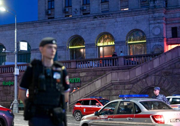 (260801) -- MOSCOW, Aug. 1, 2026 -- Security personnel work at the site of an explosion in Moscow, Russia, Aug. 1, 2026. Three people were killed and 21 others injured after an improvised explosive device detonated at a restaurant in central Moscow, Russia s National Anti-Terrorism Committee (NAC) said Saturday. According to the NAC, a woman attempted to bring the explosive device into the restaurant located near Kudrinskaya Square. She was killed when the device detonated. (Photo by Alexander Zemlianichenko Jr Xinhua) RUSSIA-MOSCOW-EXPLOSION FengxKaihua 