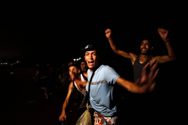 August 1, 2026, Ceuta, Spain: CEUTA, SPAIN - AUGUST 1, 2026: The arrival of migrants across the Tarajal border continues during the early hours of Saturday morning in Ceuta. Authorities maintain security and monitoring devices at the border crossing amid the ongoing influx. Ceuta Spain - ZUMAq101 20260801_zna_q101_064 Copyright: xSamuelxVegax