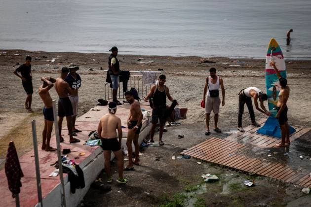 August 1, 2026, Ceuta, Spain: CEUTA, SPAIN - AUGUST 1, 2026: Migrants who remained in Ceuta cross back into Morocco through the Tarajal border crossing during the early morning hours. Ceuta Spain - ZUMAq101 20260801_zna_q101_099 Copyright: xSamuelxVegax