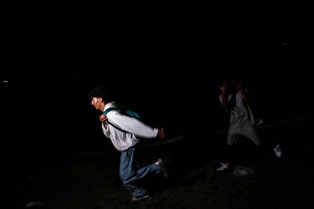 August 1, 2026, Ceuta, Spain: CEUTA, SPAIN - AUGUST 1, 2026: The arrival of migrants across the Tarajal border continues during the early hours of Saturday morning in Ceuta. Authorities maintain security and monitoring devices at the border crossing amid the ongoing influx. Ceuta Spain - ZUMAq101 20260801_zna_q101_063 Copyright: xSamuelxVegax