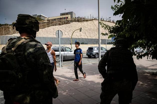 August 1, 2026, Ceuta, Spain: CEUTA, SPAIN - AUGUST 1, 2026: Migrants who remained in Ceuta cross back into Morocco through the Tarajal border crossing during the early morning hours. Ceuta Spain - ZUMAq101 20260801_zna_q101_110 Copyright: xSamuelxVegax