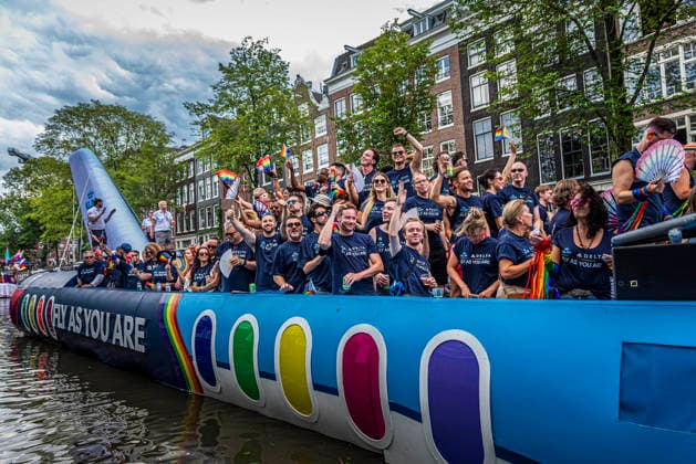 August 1, 2026, Amsterdam, North Holland, Netherlands: Delta and KLM Airlines workers join Amsterdam Pride s Canal Parade on August 1, 2026, in Amsterdam, the Netherlands. Hundreds of thousands of spectators joined the 30th edition of the Pride Canal Parade, the highlight of WorldPride Amsterdam 2026. This yearÃ¢â‚¬â ¢s parade also included the WorldPride Stadium grandstand, with seating for approximately 10,000 people to watch as floats pass by. Amsterdam Netherlands - ZUMAp202 20260801_zip_p202_098 Copyright: xJamesxPetermeierx
