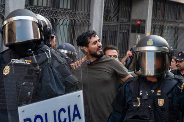 August 1, 2026, Ceuta, Spain: Spanish politician, social media influencer, and Member of the European Parliament. LUIS ALVISE PEREZ FERNÃNDEZ, 36, in Ceuta as police escort him out. Perez leads the anti-establishment and populist party Se Acabo la Fiesta (SALF), which translates to The Party Is Over. Gained prominence through guerrilla digital campaigns and anti-corruption messaging. Demonstrators gather in Ceuta to protest against far-right groups following calls for an anti-immigration rally after the arrival of tens of thousands of migrants. Authorities blocked the entry of members of the group Nucleo Nacional. Ceuta Spain - ZUMAq101 20260801_zna_q101_218 Copyright: xMarioxMorenox