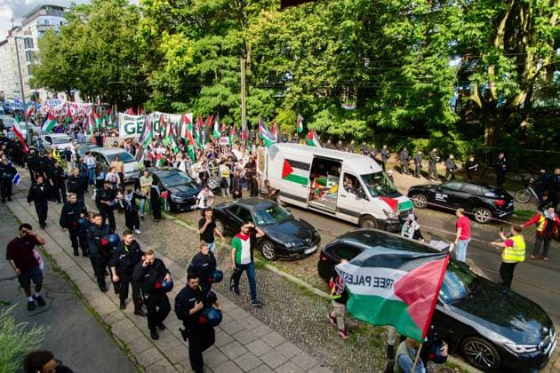 August 1, 2026, Berlin, Germany: BERLIN, Germany Ã¢â‚¬ August 2026: Thousands of people march through the Prenzlauer Berg district of Berlin in solidarity with Palestine and against the ongoing war in Gaza. The demonstration, attended by families, children, and elderly participants, took place under heavy police presence. A counter-demonstration was also held by pro-Zionist groups, with police monitoring both gatherings. Berlin Germany - ZUMAq101 20260801_zna_q101_247 Copyright: xAndro SxTrujillox