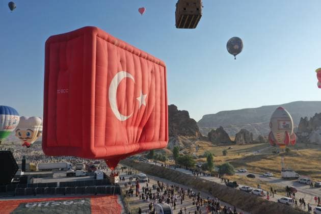 Cappadocia Balloon Festival concludes with colorful scenes NEVSEHIR, TURKIYE - AUGUST 2: A view of a Turkish flag shaped balloon during the 7th Cappadocia Balloon Festival concluded with the participation of 30 special-shaped hot air balloons brought from Turkiye and abroad in Nevsehir, Turkiye, on August 2, 2026. As part of the festival, sunrise demonstration flights over Goreme featured heart, owl, parrot, rocket, and globe-shaped balloons, creating colorful scenes above the region s iconic fairy chimneys and attracting the attention of both local and international visitors. Behcet Alkan Anadolu Nevsehir Turkey. Editorial use only. Please get in touch for any other usage.  Copyright: x2026xAnadoluxBehcetxAlkanx