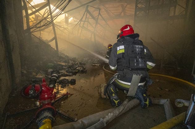 Russian drone strike hits book warehouse in Kharkiv KHARKIV, UKRAINE - AUGUST 1: Firefighters respond to area after two Russian attack drones struck a book warehouse destroying part of the building and sparking a fire that spread across 8,900 square meters in Kharkiv, Ukraine, on August 1, 2026. No casualties were reported, though one firefighter suffered heatstroke while battling the blaze. The warehouse belongs to Ukrainian publisher Ranok and also serves as the distribution center for the KnygoLand bookstore chain. Serhii Masin Anadolu Kharkiv Ukraine. Editorial use only. Please get in touch for any other usage.  Copyright: x2026xAnadoluxSerhiixMasinx