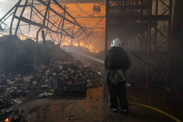 Russian drone strike hits book warehouse in Kharkiv KHARKIV, UKRAINE - AUGUST 1: Firefighters respond to area after two Russian attack drones struck a book warehouse destroying part of the building and sparking a fire that spread across 8,900 square meters in Kharkiv, Ukraine, on August 1, 2026. No casualties were reported, though one firefighter suffered heatstroke while battling the blaze. The warehouse belongs to Ukrainian publisher Ranok and also serves as the distribution center for the KnygoLand bookstore chain. Serhii Masin Anadolu Kharkiv Ukraine. Editorial use only. Please get in touch for any other usage.  Copyright: x2026xAnadoluxSerhiixMasinx