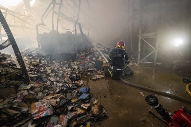 Russian drone strike hits book warehouse in Kharkiv KHARKIV, UKRAINE - AUGUST 1: Firefighters respond to area after two Russian attack drones struck a book warehouse destroying part of the building and sparking a fire that spread across 8,900 square meters in Kharkiv, Ukraine, on August 1, 2026. No casualties were reported, though one firefighter suffered heatstroke while battling the blaze. The warehouse belongs to Ukrainian publisher Ranok and also serves as the distribution center for the KnygoLand bookstore chain. Serhii Masin Anadolu Kharkiv Ukraine. Editorial use only. Please get in touch for any other usage.  Copyright: x2026xAnadoluxSerhiixMasinx